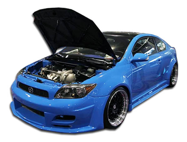 2005-2010 Scion tC Duraflex Touring Wide Body Kit - 8 Piece - Includes Touring Wide Body Front Bumper Cover (103041) Touring Wide Body Rear Bumper Cover (103043) Touring Wide Body Side Skirts Rocker Panels (103042) Touring Wide Body Fender Flares (103044)