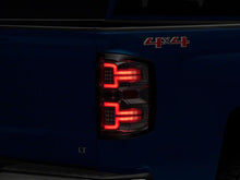 Load image into Gallery viewer, Raxiom 14-18 Chevrolet Silverado 1500 LED TailLights/SeqTurn Signals- Chrome- Smoked Lens