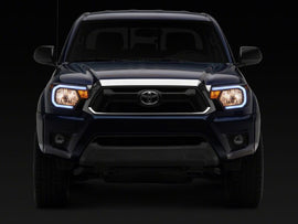 Raxiom 12-15 Toyota Tacoma Axial Series Headlights/Seq LED Bar- Black- Clear Lens