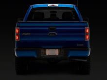Load image into Gallery viewer, Raxiom 97-14 Ford F-150 Axial Series License Plate Lamp Housings