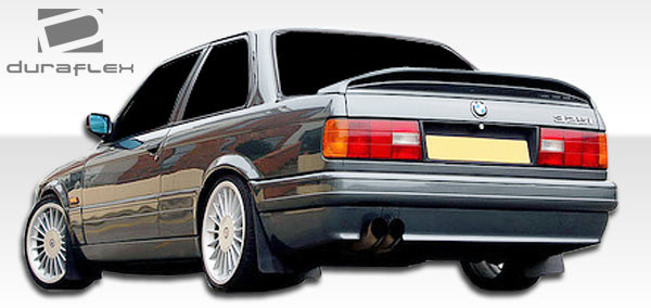 1984-1987 BMW 3 Series E30 2DR Duraflex M-Tech Body Kit - 6 Piece - Includes M-Tech Front Bumper Cover (105323) M-Tech Side Skirts Rocker Panels (105046) M-Tech Door Panels (105048) M-Tech Rear Bumper Cover (105324)