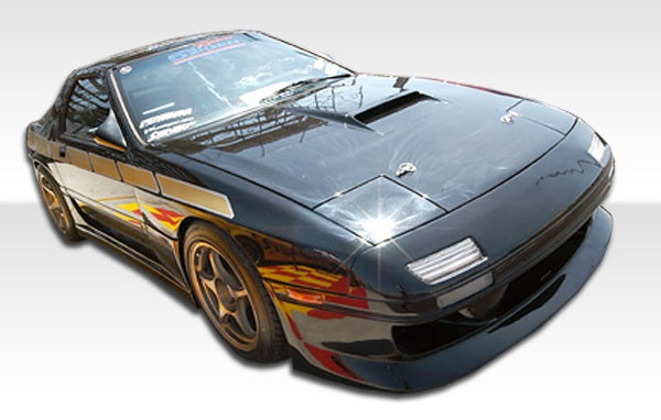 1986-1991 Mazda RX-7 Duraflex GP-1 Body Kit - 4 Piece - Includes GP-1 Front Bumper Cover (100725) GP-1 Rear Bumper Cover (100726) GP-1 Side Skirts Rocker Panels (100727)