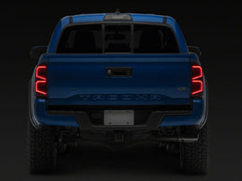 Raxiom 16-23 Toyota Tacoma ST LED Tail Lights- Black Housing- Smoked Lens