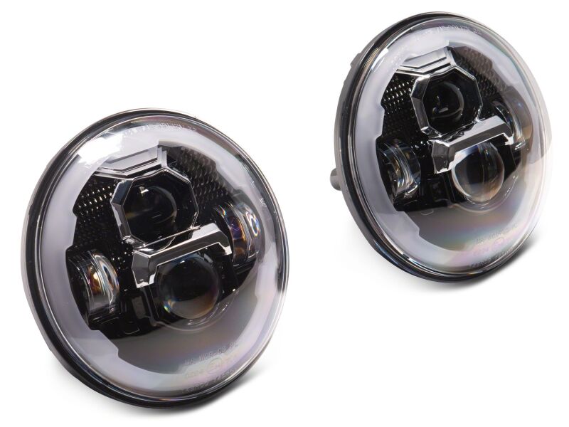 Raxiom 07-18 Jeep Warngler Axial Series 7-Inch LED Headlights w DRL/ Black Housing - Clear Lens