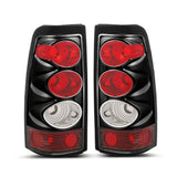 Raxiom 03-06 Chevrolet Silverado 1500 Fleetside Axial Series Tail Lights- Black- Clear Lens