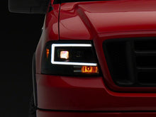 Load image into Gallery viewer, Raxiom 04-08 Ford F-150 Axial Series Projector Headlights- Black Housing- Clear Lens