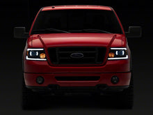 Load image into Gallery viewer, Raxiom 04-08 Ford F-150 Axial Series Projector Headlights with LED Bar- Black Housing- Clear Lens