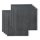 Eight 17 inch by 18 inch sheets of Boom Mat Acoustic Tile.
