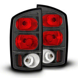 Raxiom 02-05 Dodge RAM 1500 Axial Series Tail Lights- Carbon Fiber Housing- Red/Clear Lens