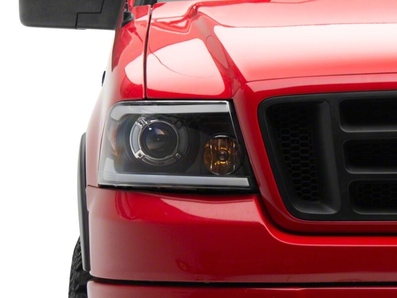 Raxiom 04-08 Ford F-150 Axial Series LED Proj Hlights/Seq LED Bar- Black- Clear Lens