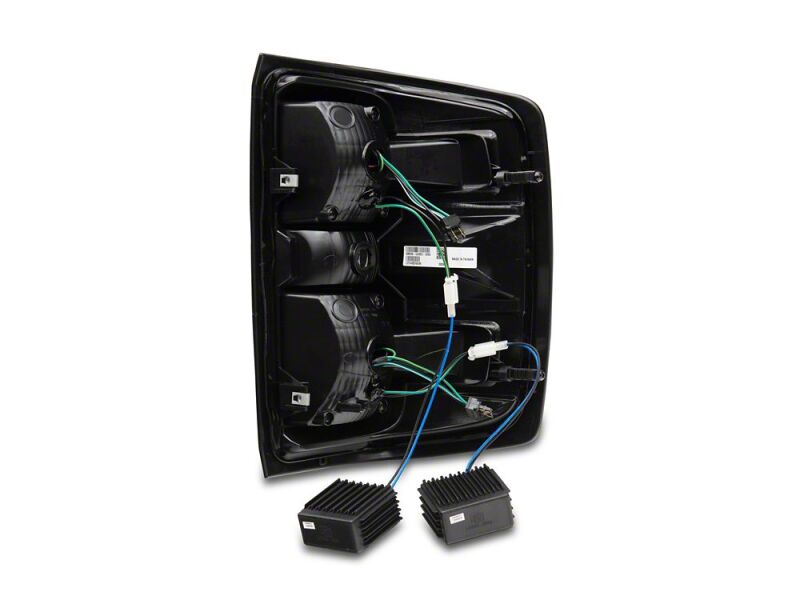 Raxiom 14-18 Chevrolet Silverado 1500 LED TailLights/SeqTurn Signals- Chrome- Smoked Lens