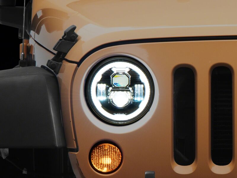 Raxiom 07-18 Jeep Warngler Axial Series 7-Inch LED Headlights w DRL/ Black Housing - Clear Lens