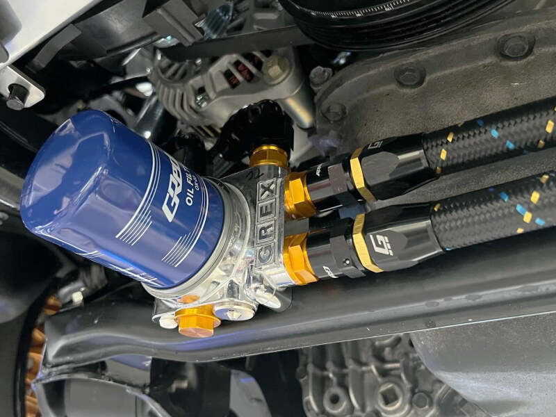 GReddy AN04 REUSABLE HOSE NYLON BRAIDED BLACK/GOLD/BLUE (PRICE PER FOOT)