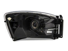Load image into Gallery viewer, Raxiom 06-08 Dodge RAM 1500 Axial Series Euro Headlights- Black Housing- Clear Lens