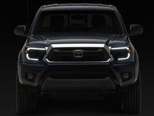 Load image into Gallery viewer, Raxiom 12-15 ToyotaTacoma Axial Series Switchback Projector Headlights- Black Housing- Clear Lens