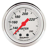 Traditional incandescent lighting illuminates around the perimeter of the dial