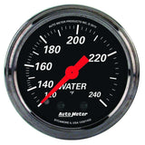 Traditional incandescent lighting illuminates around the perimeter of the dial