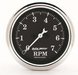 Traditional incandescent lighting illuminates around the perimeter of the dial