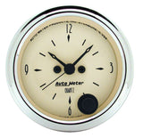Traditional incandescent lighting illuminates around the perimeter of the dial