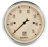 Traditional incandescent lighting illuminates around the perimeter of the dial