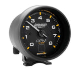 Traditional incandescent lighting illuminates around the perimeter of the dial