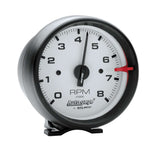 Traditional incandescent lighting illuminates around the perimeter of the dial