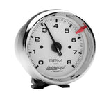 Traditional incandescent lighting illuminates around the perimeter of the dial