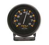 Traditional incandescent lighting illuminates around the perimeter of the dial