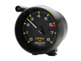 Traditional incandescent lighting illuminates around the perimeter of the dial