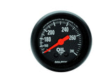 Traditional incandescent lighting illuminates around the perimeter of the dial