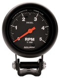Traditional incandescent lighting illuminates around the perimeter of the dial
