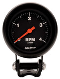 Traditional incandescent lighting illuminates around the perimeter of the dial