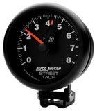 Traditional incandescent lighting illuminates around the perimeter of the dial