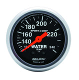 Traditional incandescent lighting illuminates around the perimeter of the dial