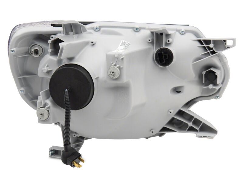 Raxiom 12-15 Toyota Tacoma Axial Series Switchback Projector Headlights- Chrome- Clear Lens