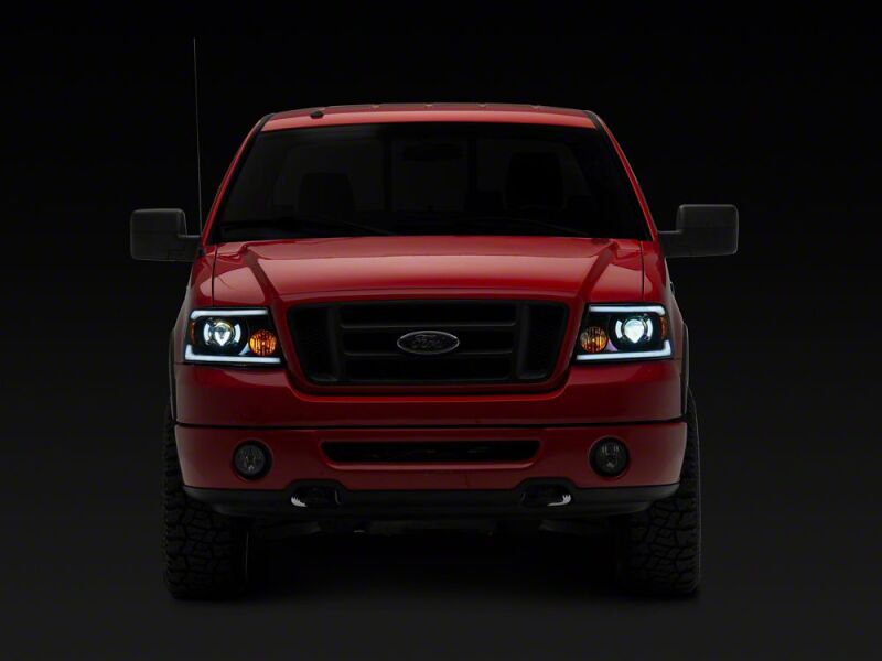 Raxiom 04-08 Ford F-150 Axial Series LED Proj Hlights/Seq LED Bar- Black- Clear Lens