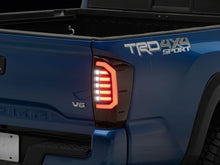 Load image into Gallery viewer, Raxiom 16-23 Toyota Tacoma LDS Series LED Tail Lights- Black Housing- Smoked Lens