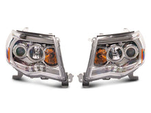 Load image into Gallery viewer, Raxiom 05-09 Toyota Tacoma Super White LED Halo Projector Headlights- Chrome Housing- Clear Lens