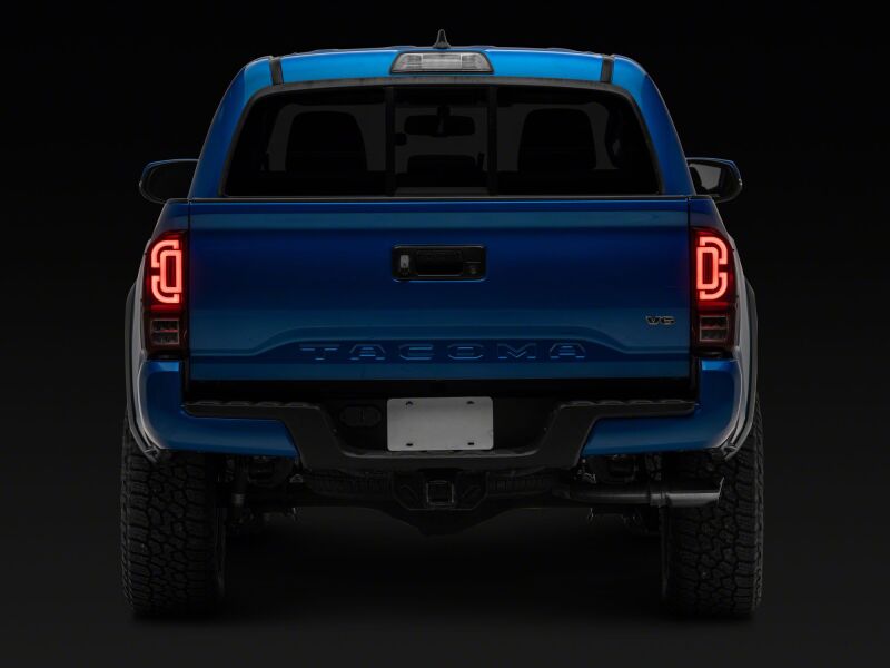Raxiom 16-23 Toyota Tacoma XW Series Sequential LED Tail Lights- Black Housing- Red Lens