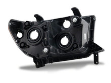 Load image into Gallery viewer, Raxiom 07-13 Toyota Tundra OEM Style Headlights- Black Housing- Clear Lens