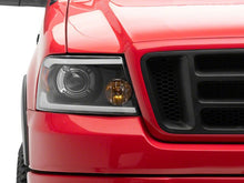 Load image into Gallery viewer, Raxiom 04-08 Ford F-150 Axial Series Projector Headlights with LED Bar- Black Housing- Clear Lens