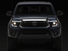 Load image into Gallery viewer, Raxiom 12-15 ToyotaTacoma Axial Series Switchback Projector Headlights- Black Housing- Clear Lens