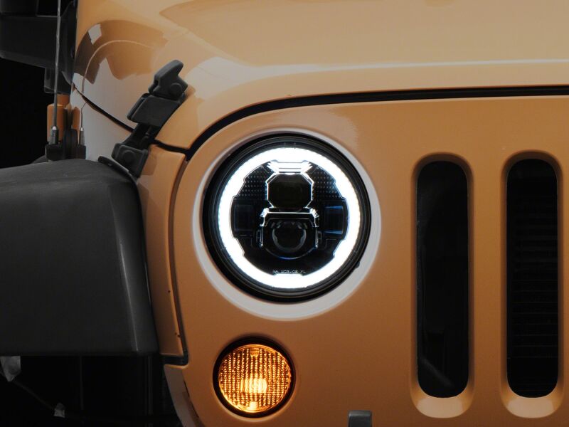Raxiom 07-18 Jeep Warngler Axial Series 7-Inch LED Headlights w DRL/ Black Housing - Clear Lens