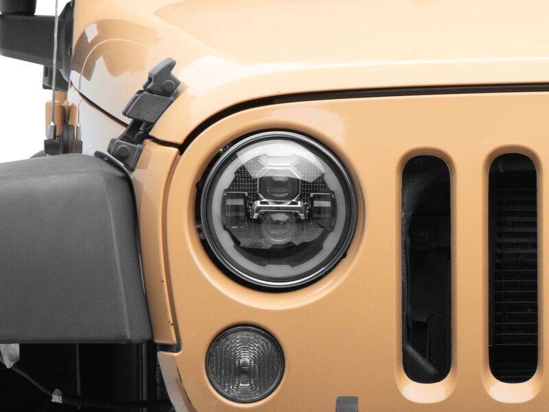 Raxiom 07-18 Jeep Warngler Axial Series 7-Inch LED Headlights w DRL/ Black Housing - Clear Lens